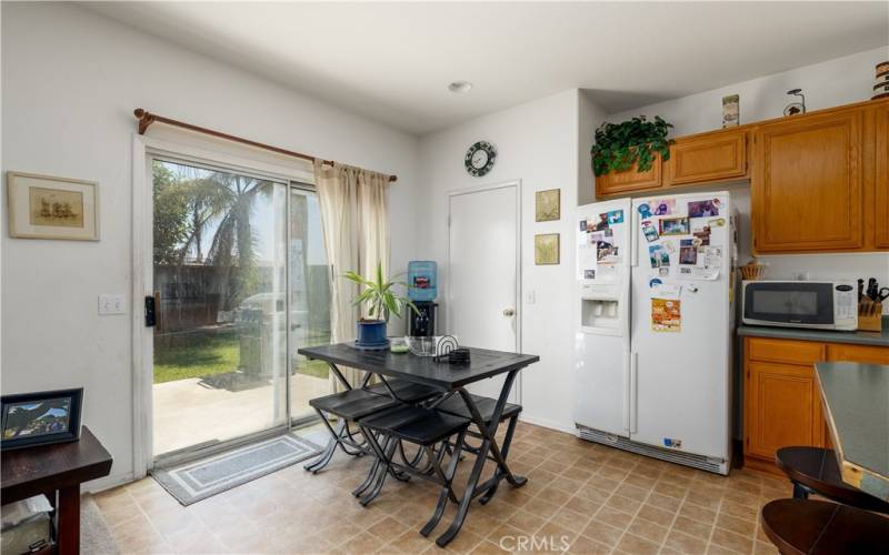 Eating area with pantry door.