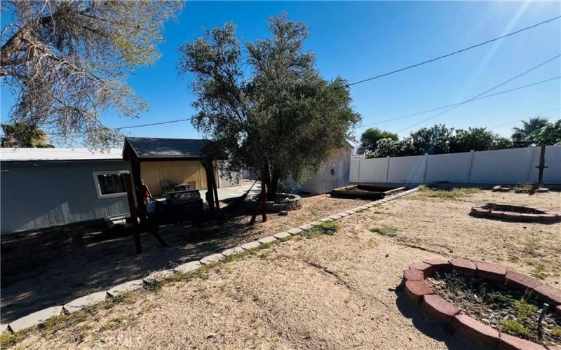 back yard facing house ample view