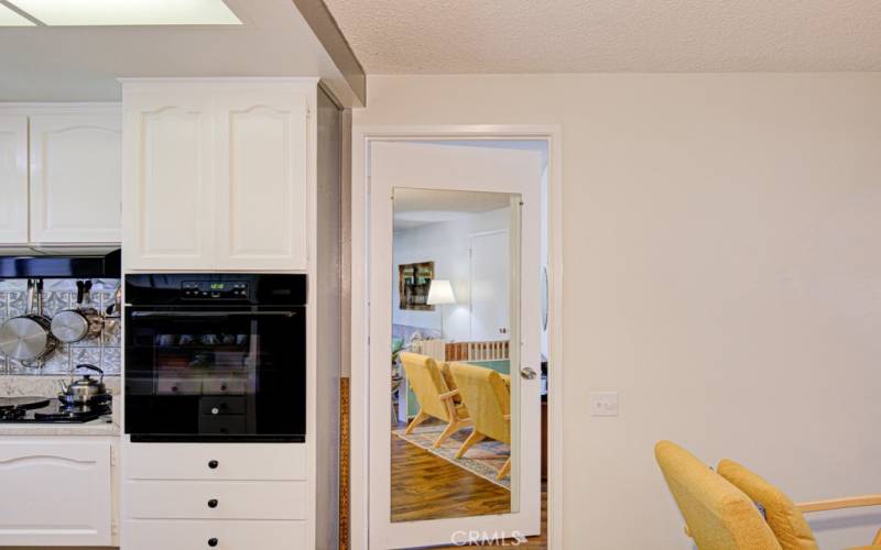 Looking from the kitchen/dining area toward the bedroom.