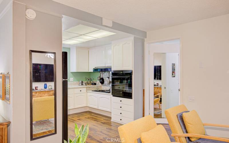 View from the dining area into the kitchen.