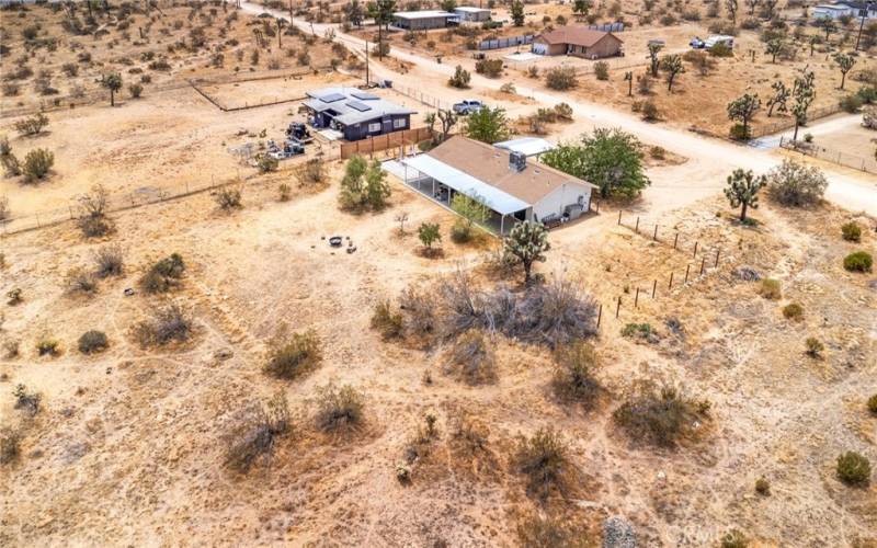 Arial view showing home from side back yard.