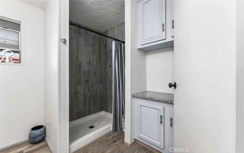 Built in cabinets in hallway bathroom