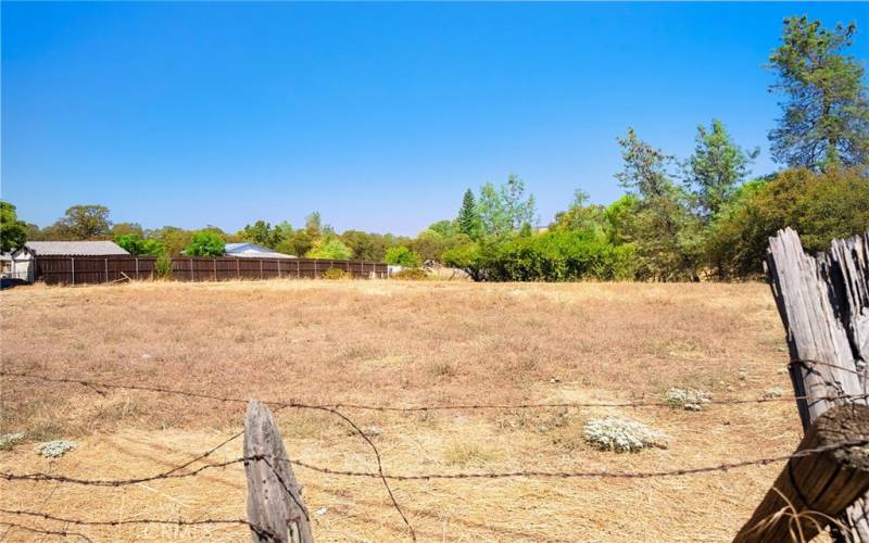 Just over an acre of flat land at the SE corner (Oak Knoll and Seacrest)