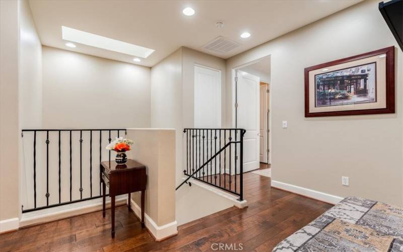 Stairs to 2nd Floor and Hallway between Primary Bedroom and 2nd & 3rd Bedrooms