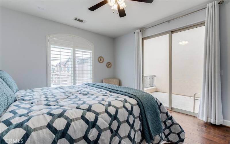 Primary Bedroom with Sliding Glass Door to Outdoor Balcony