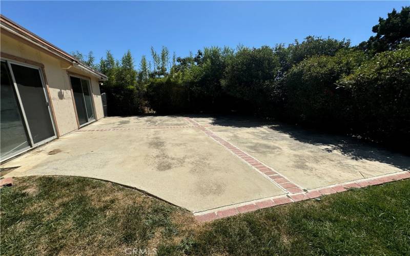 CONCRETE SLAB WITH BRICKS OUTSIDE THE BONUS ROOM  PERFECT AREA FOR AN ADU