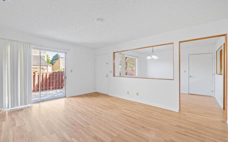 Living room with sliding door access to yard