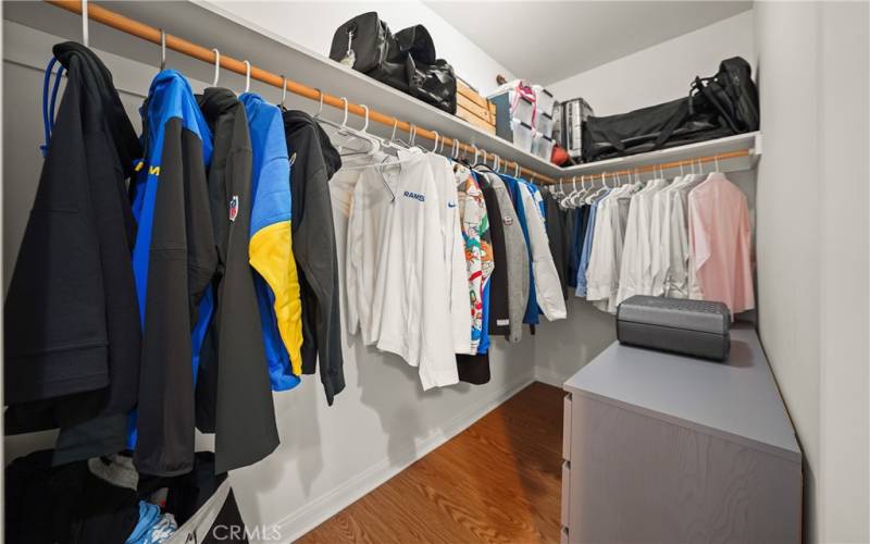 Primary bedroom walk-in closet