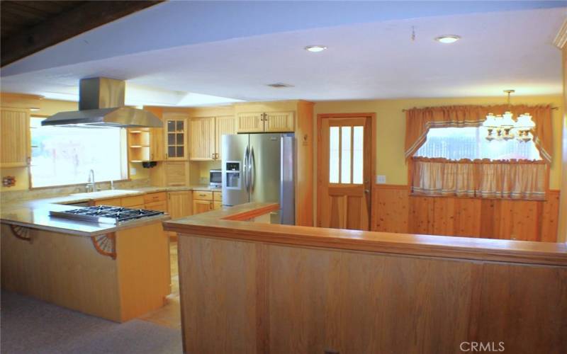 Remodeled kitchen with granite counters.