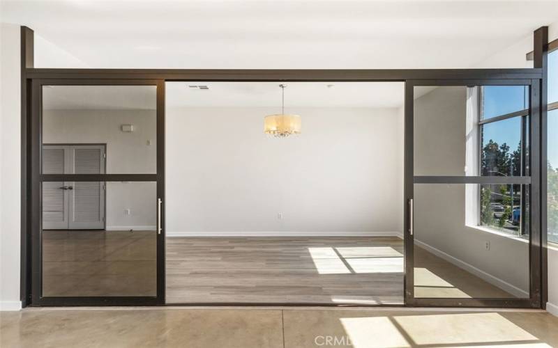 Sliding doors separate primary from family room