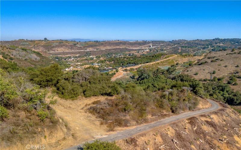 Spectacular hilltop property with areas for a homesite with panoramic views!