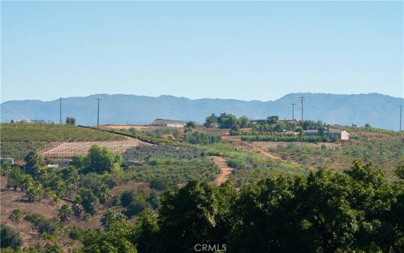 Neighboring property looking North with hillside views.