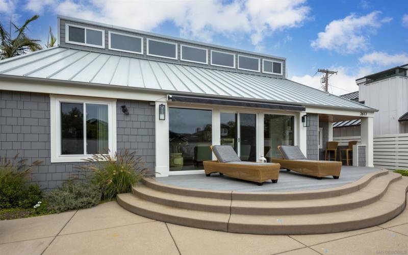 Front exterior of house after entering courtyard