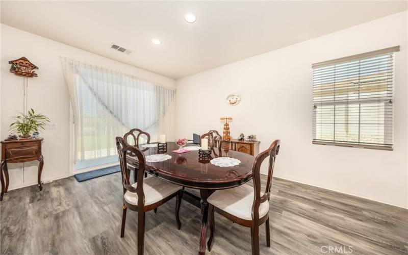 Eating Area off Kitchen with Slider to the Backyard.