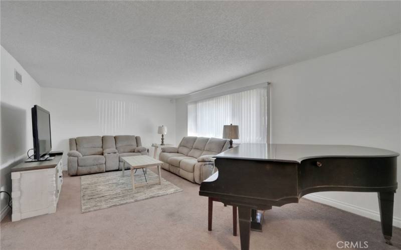 Formal Living Room at main entrance.  Spacious for entertaining or relaxing