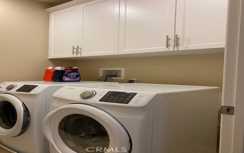 Laundry room, plenty of storage.