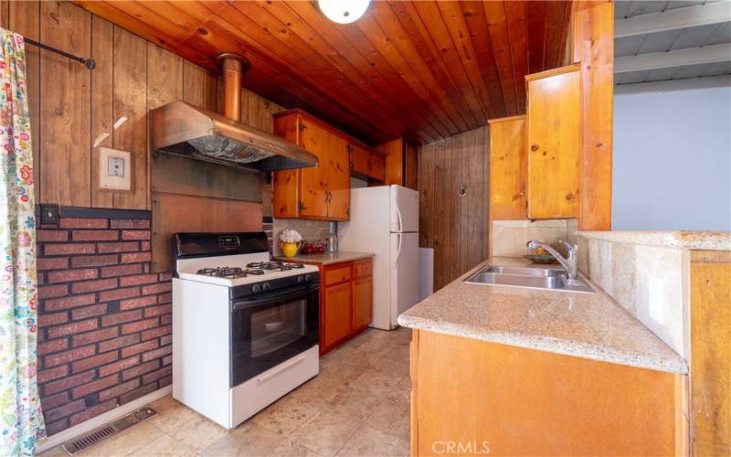 Kitchen with granite counters, appliances included