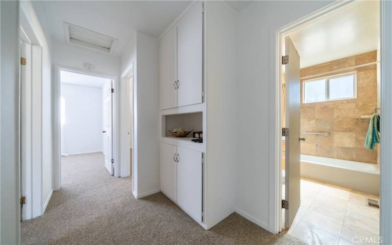 Linen cabinet in hallway