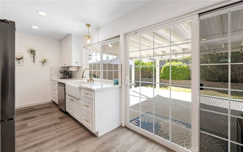 Kitchen overlooking backyard