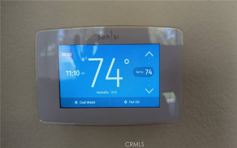 Wi-fi thermostat and garage door allows you to set temperature and open/close door from anywhere with your smart phone!