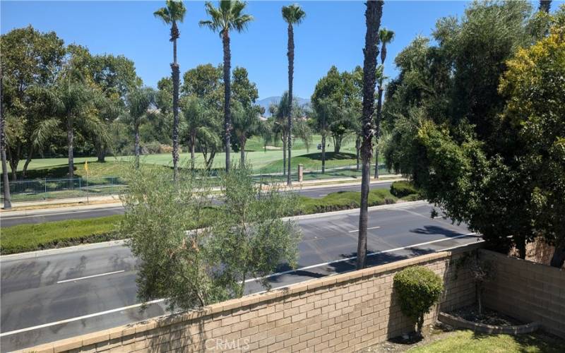 This View Upstairs is even Better! Clubhouse Drive is a quiet buffer between the course and home.