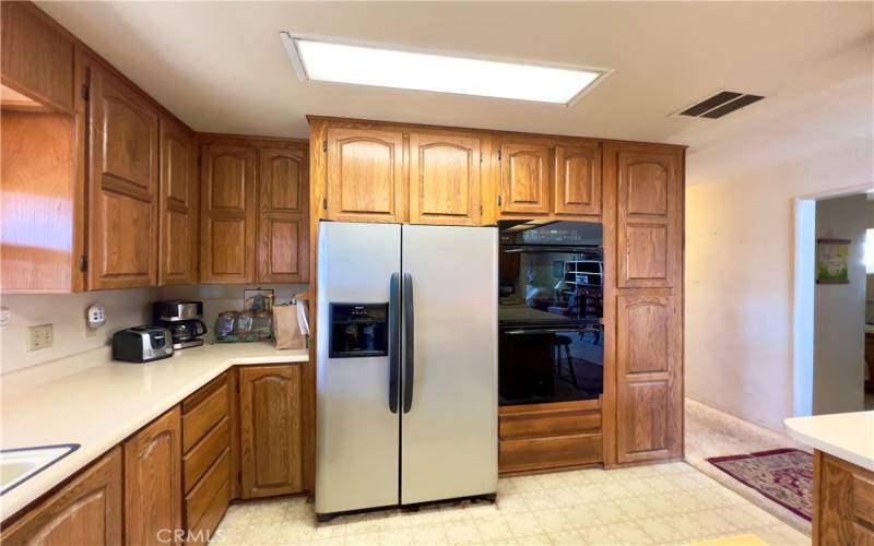 Kitchen with Refrigerator and Dual Ovens