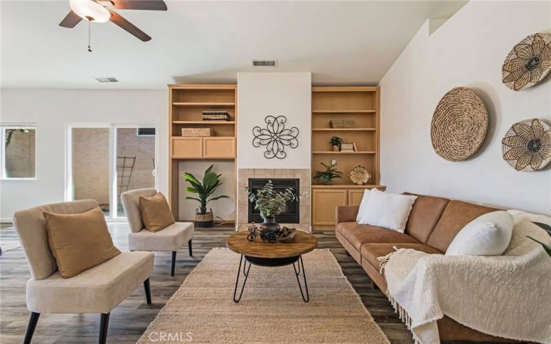 Living Area with gas fireplace insert.