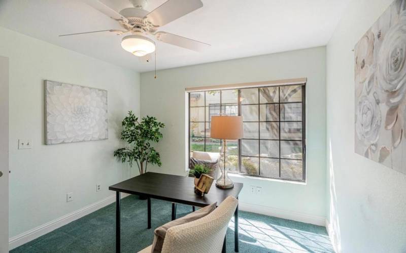 cozy study room. With serene light pastel green tones to soothe the mind