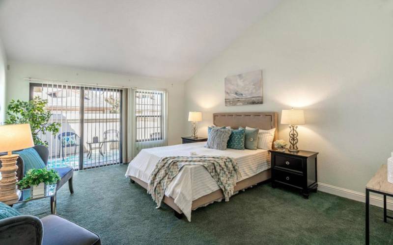 double door spacious high ceiling main bedroom