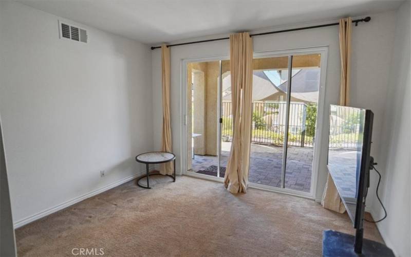 Bottom floor bedroom with patio view