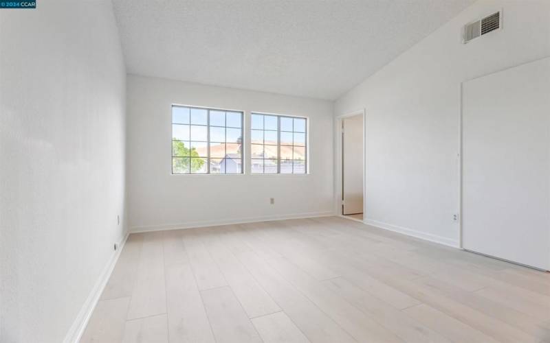 Primary bedroom & full bathroom