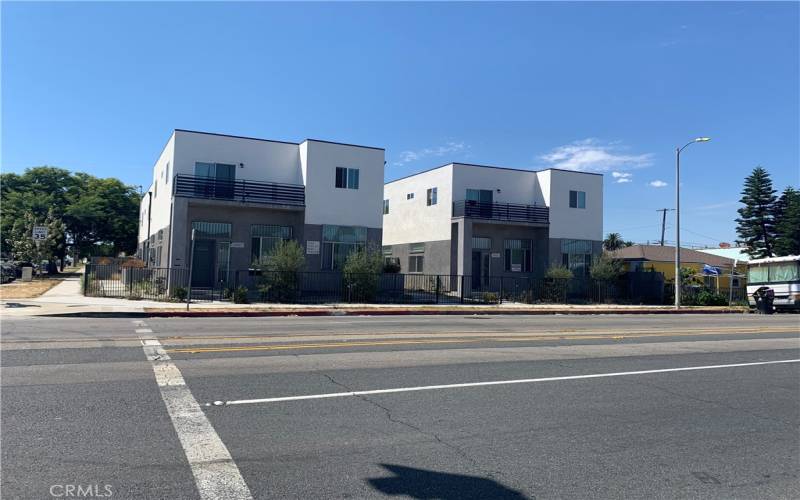 Multi-Family Across the Street - City States something similar can be built on  the Vacant Lot