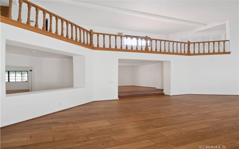 Looking up from the Living Room to the upstairs hallway