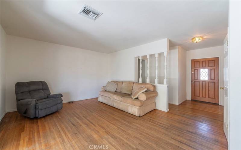 Living room with original hard wood floors