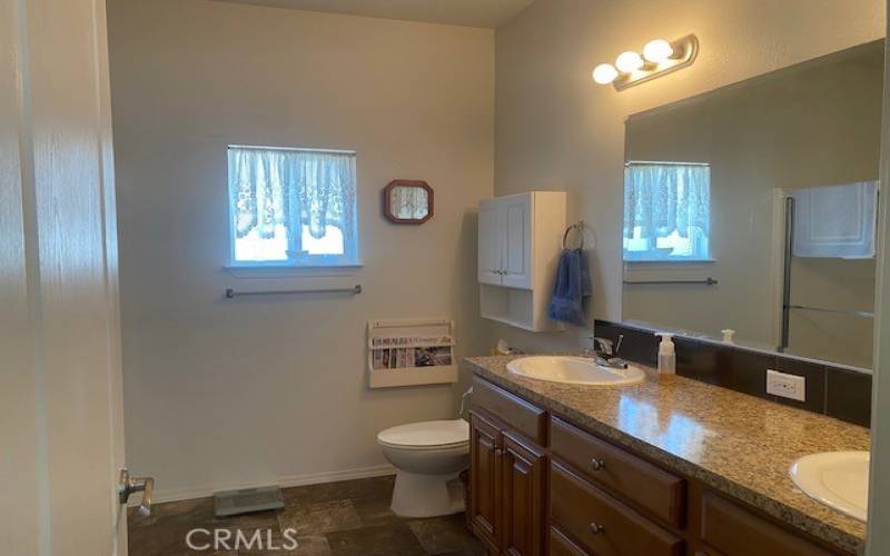 Master bathroom with dual sinks.