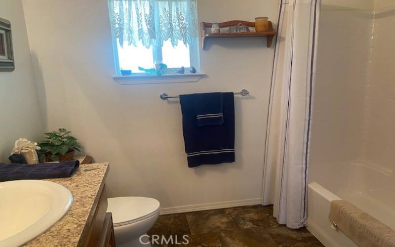 Hall bathroom with Tub & Shower.