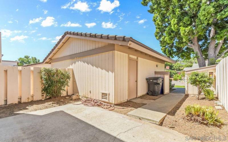 Front courtyard and 1 car detached garage entry