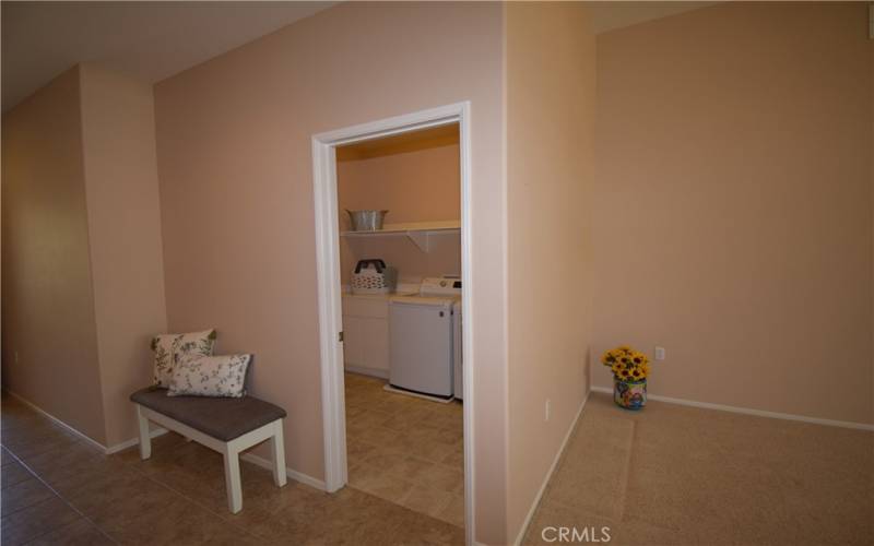 Laundry room with interior garage door