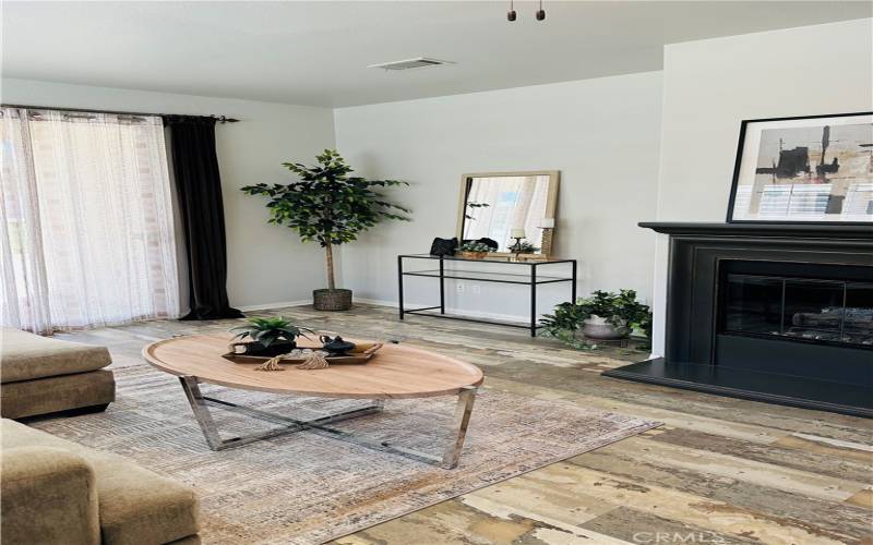 Living area with gas fireplace.