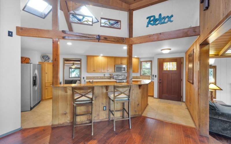 View of kitchen and main entry