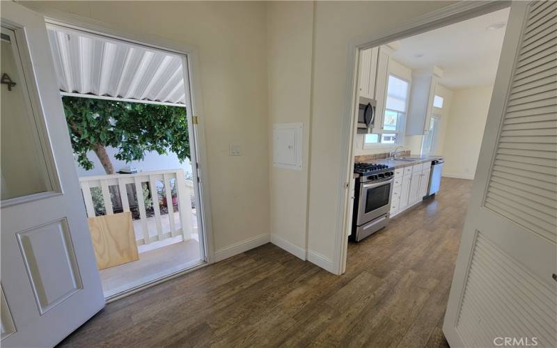 The laundryroom exits to the carport and enters to the kitchen. It also has loads of cabinet space!