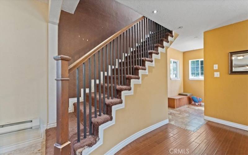 entryway and stairway to upstairs master bedroom