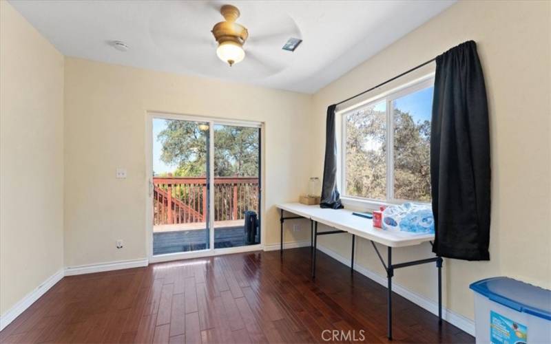 eating area next to kitchen looking out onto deck