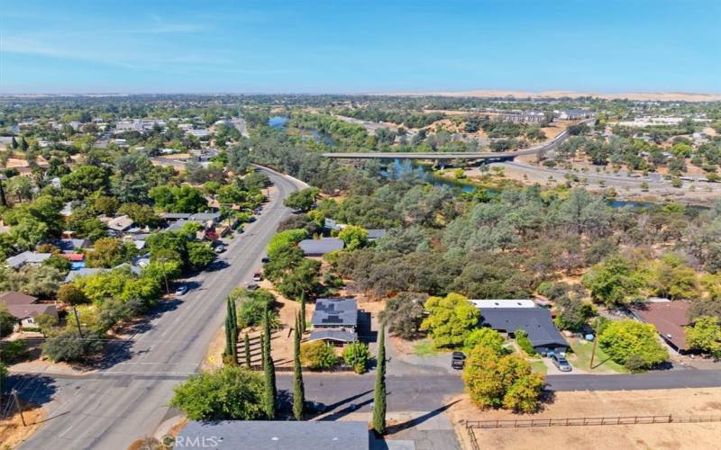 Aerial view of the property.  river and bridge in the distance.