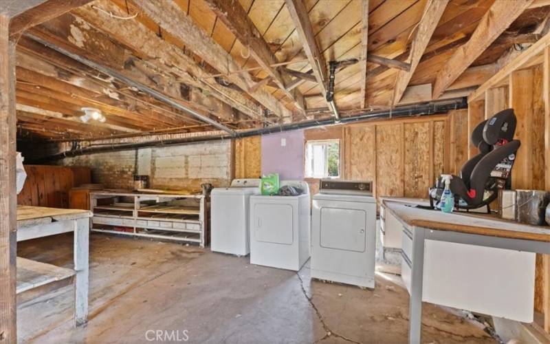 Basement with washer and dryer