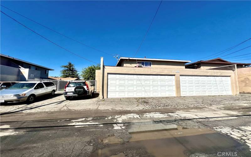 2458 Chanslor Pomona - 4 garage parking and 2 outdoor guest parking spaces in back of building.