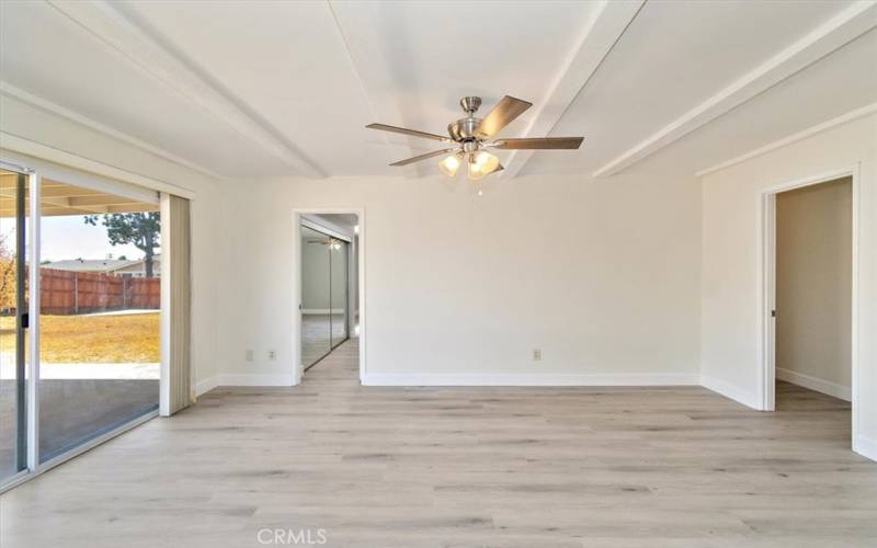 Family room with gorgeous wood beams.