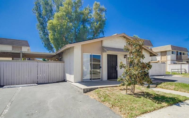 Private parking space next to unit of of back patio