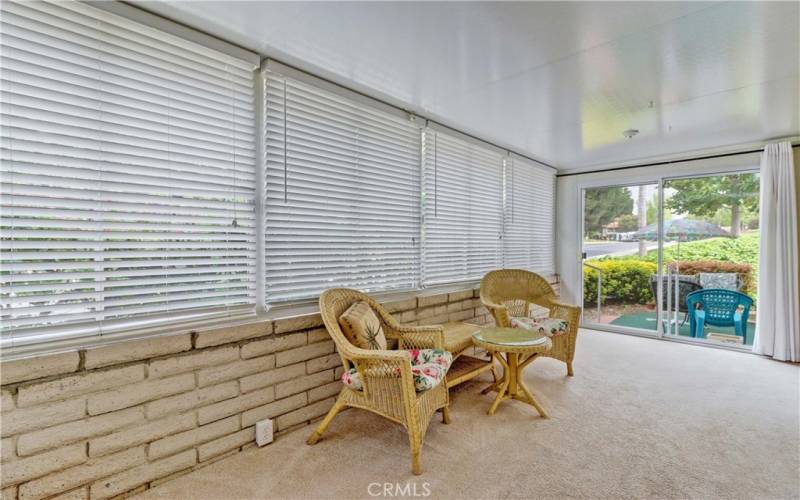 Enclosed Patio with door on both ends & doors into living room & guest bedroom