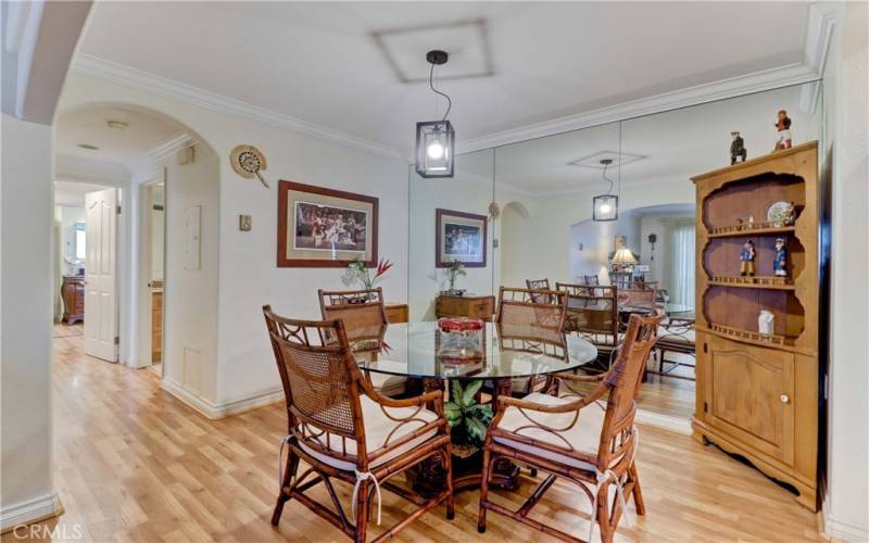 Mirrored Dining Area Wall & Arched-Entrance Hall to Bedrooms